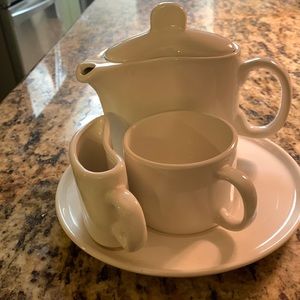 One person tea set. Teapot with cup,creamer and matching tray.